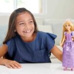 Mattel Disney Princess Dolls, Rapunzel Posable Fashion Doll with Sparkling Clothing and Accessories, Disney Movie Toys